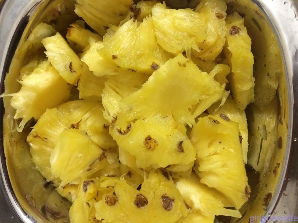 Pineapple cut into pieces.